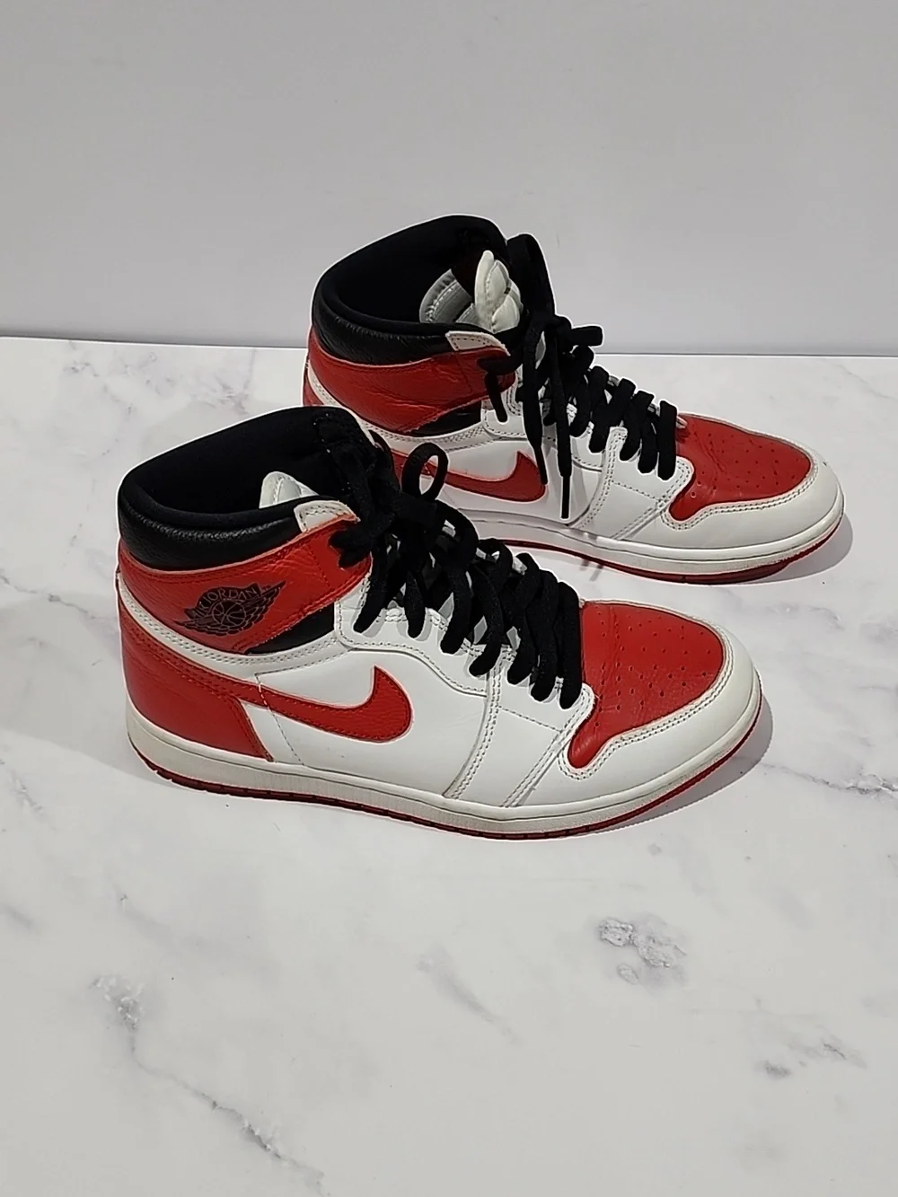 Nike  Air Jordan 1 Red and White High-Top Sneakers